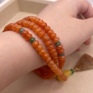 Vibrant Orange Jade Necklace with Intricate Design